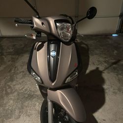 Liberty S 50 cc scooter and sedici helmet L size