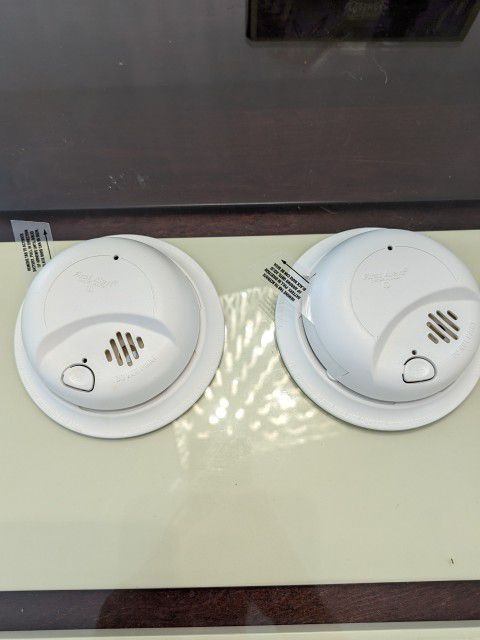Two wired Smoke Alarms