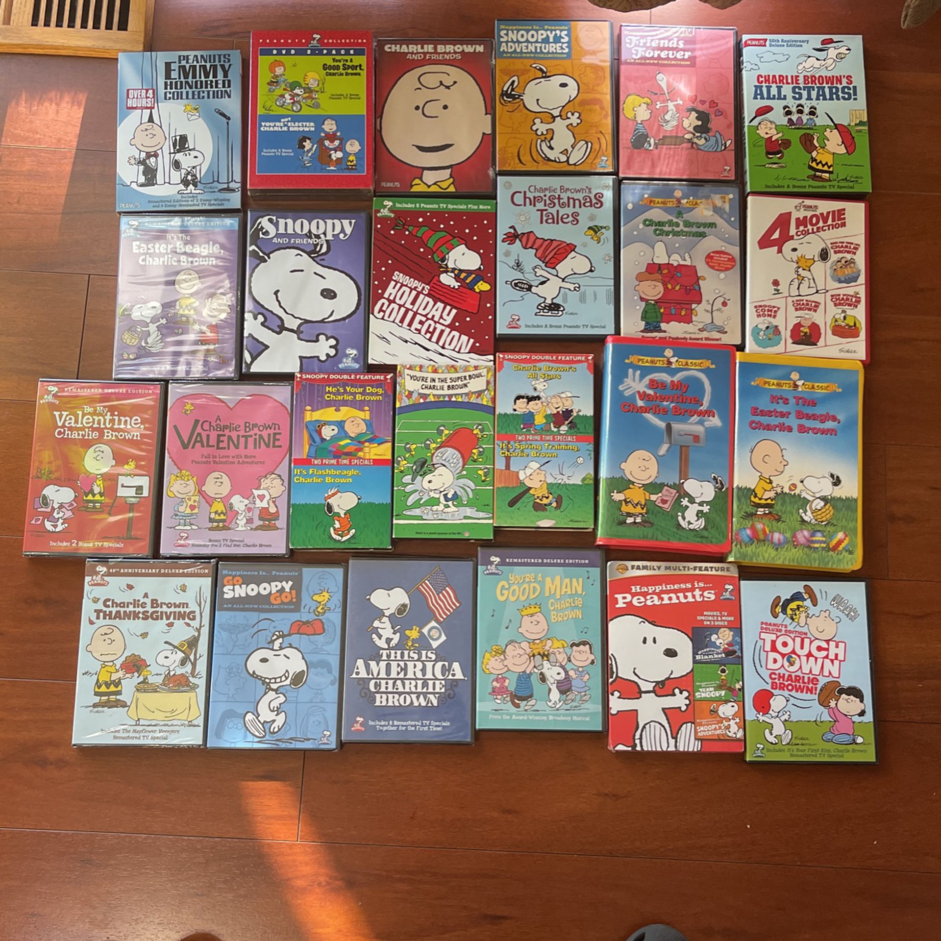 25 Charlie Brown VHS tapes & DVDS