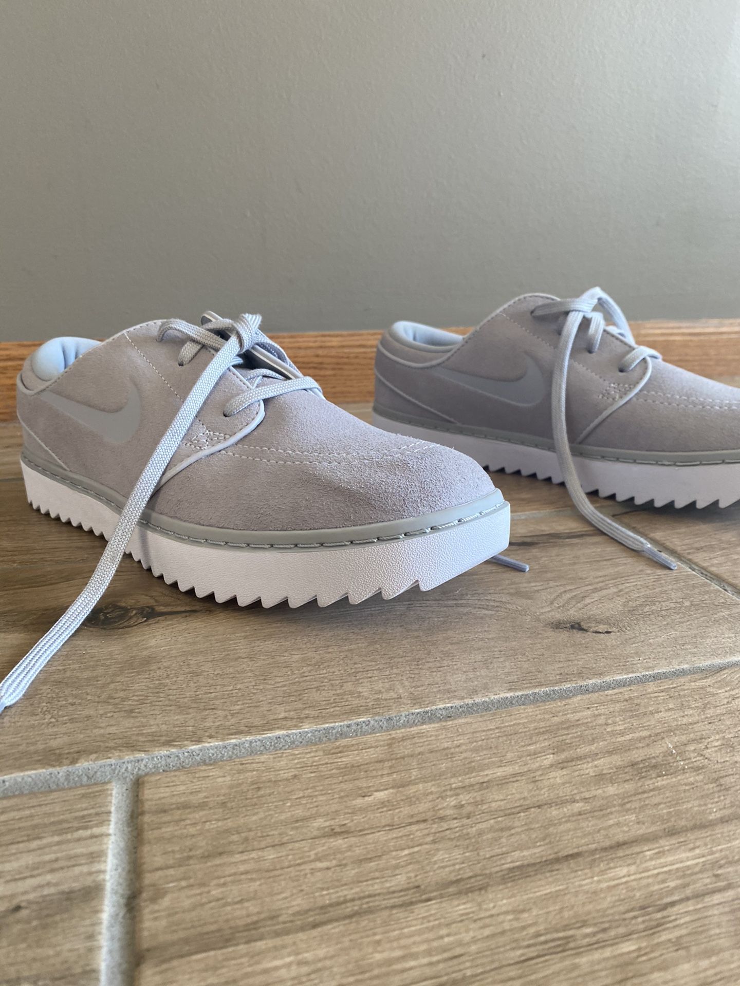 Janoski grey and white Nikes