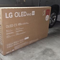 New 65 Inch Oled LG C5 Smart TV 4K UHD with 120 Hz refresh rate brand new in the box.