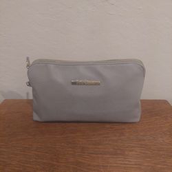 Stylish Gray Pouch/ Cosmetic Bag by Steve Madden.
11"X7"