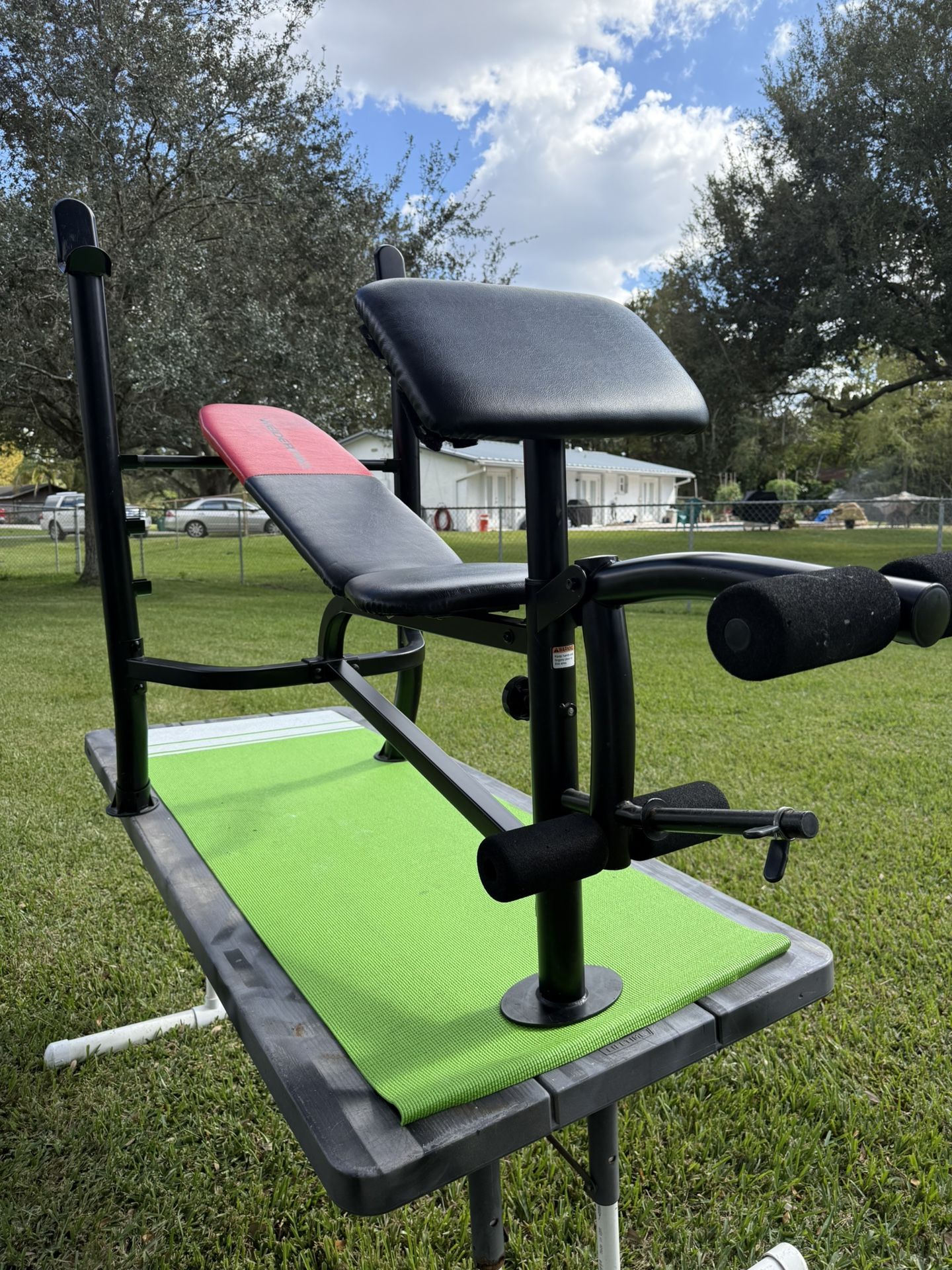 Weider Weight Bench With Uprights For Bench Presses, Preacher Curl, And Leg Extension Attachments