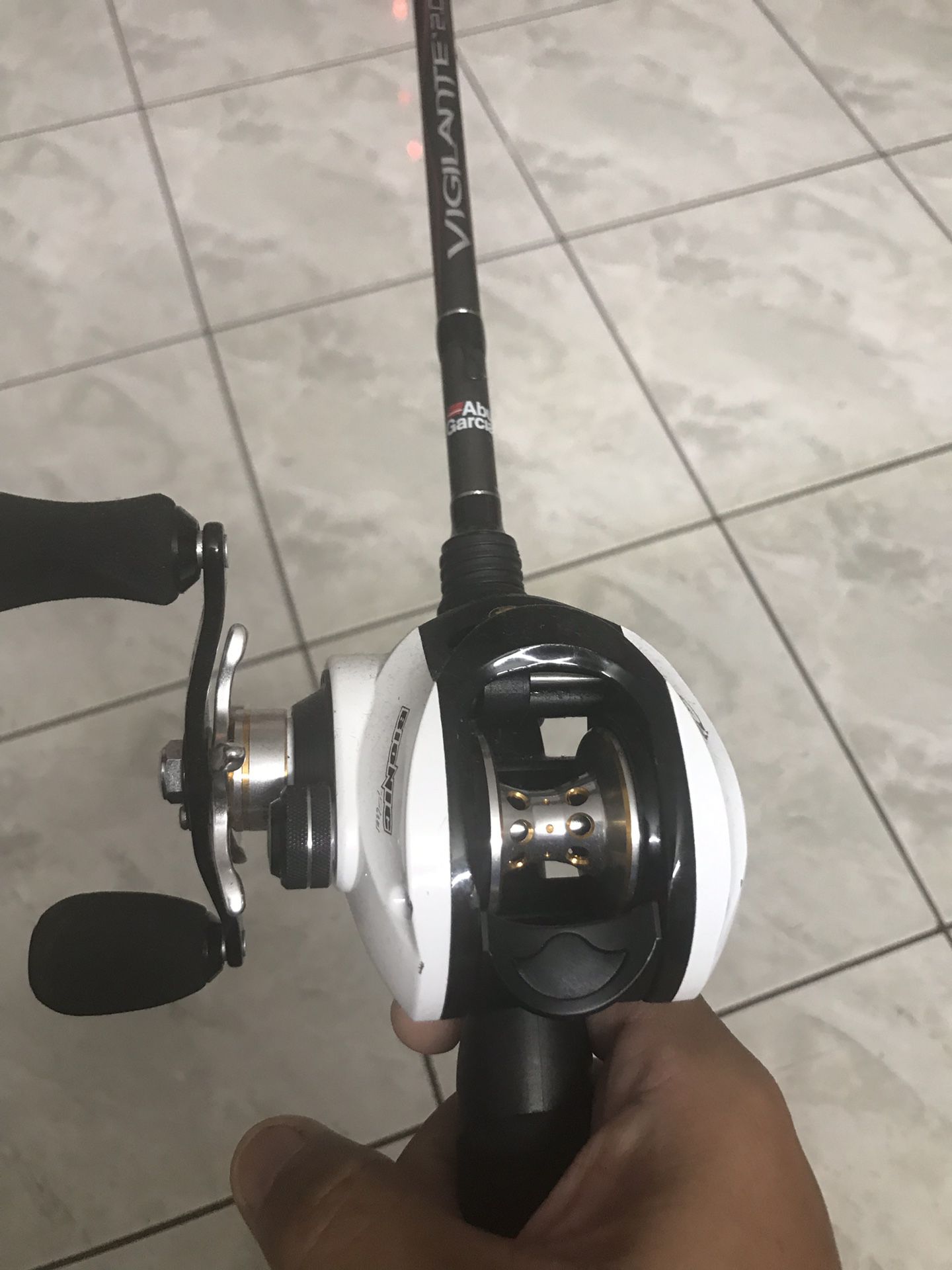 Abu Garcia 7ft 8-17lb with left handed Bass pro shops fishing reel. $70 like new.