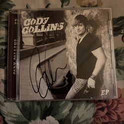 This is a rare signed EP CD by artist Cody Collins, released in 2011 under the record label Radical Production Media in the United States. The CD is i