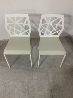 Two White Leather Chairs