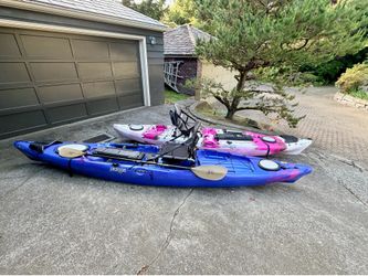 Two Jackson Cuda Fishing Kayaks 14’ and 12’