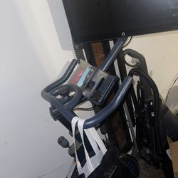 Exercise bike w/ attached screen devices 