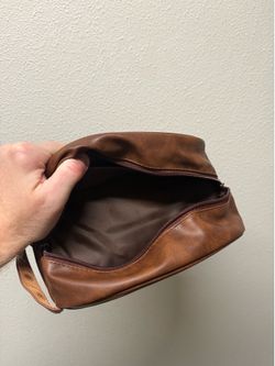 Brown leather toiletry bag