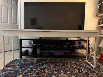 Modern white storage cabinet with drawers