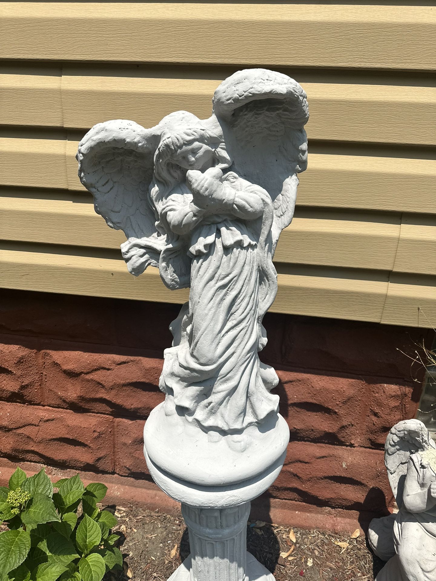 Angel De Cemento