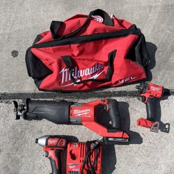 Milwaukee tool set ,Fuel 1/2 impact , M18 FUEL Super SAWZALL,impact Driver 1/4 , battery , charger, bag  
