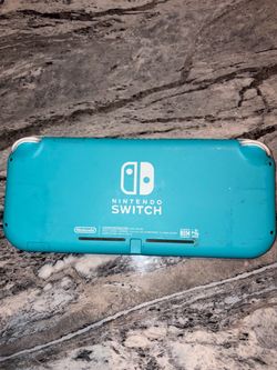 Blue Nintendo lite switch with 6 games