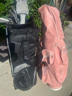 Golf clubs and extra pink bag