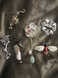 Woman’s Brooches