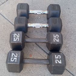 Two Sets Of Dumbbells 25 Lb 15 Lb