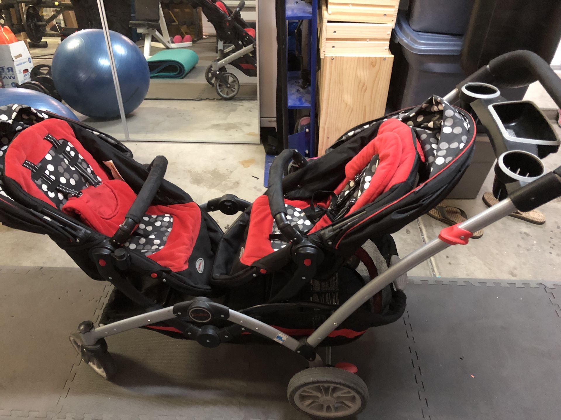 Contours double stroller red, black multi seats