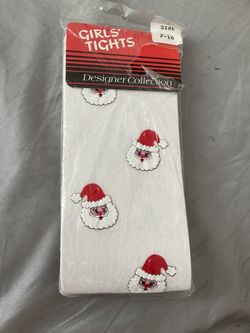 New pair of girls’ tights (pantyhose), labeled “Designer Collection,” size 7–10, with a Santa Claus holiday print. * Kids’ tights/stockings, typically