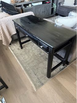 Small black wooden desk