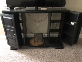 Black TV stand. Excellent condition