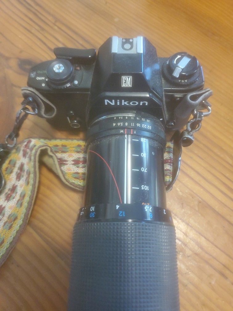 Nikon 35 Mm Camera With Telephoto Lense