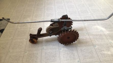 Vintage cast-iron tractor lawn sprinkler
