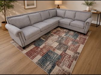 Nice L-shaped gray sectional sofa can be delivered for an additional cost Price 350