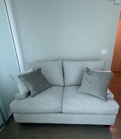 Almost New Love Seat ( Down) - Living spaces ( Model:Harper)