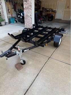 Three-rail folding motorcycle trailer