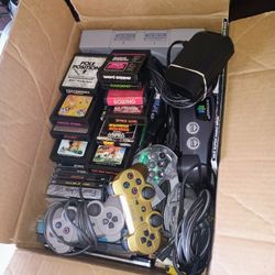 Box Of Video Game Consoles, Controllers, And Games