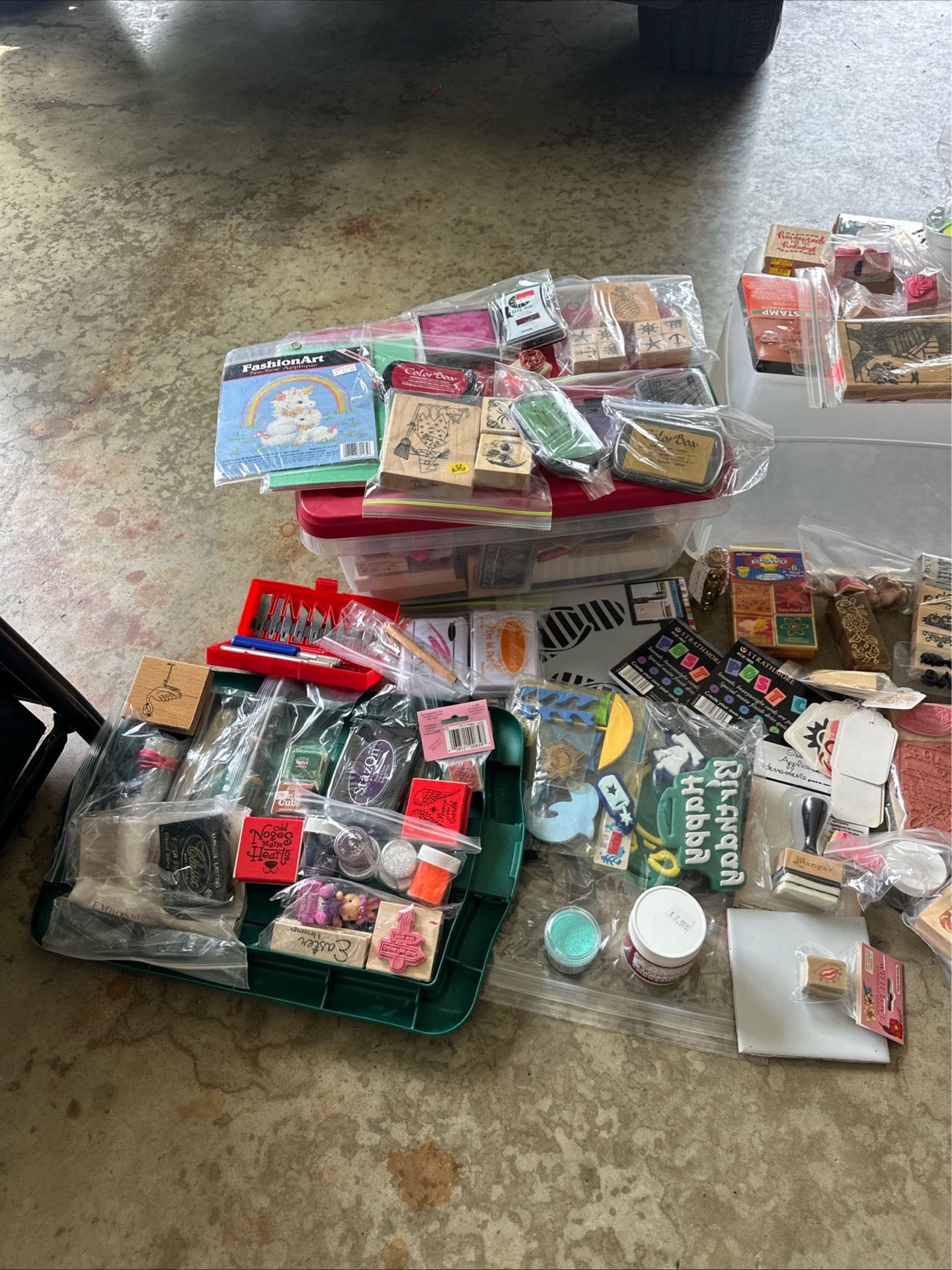 collection of vintage rubber stamps and crafting supplies.