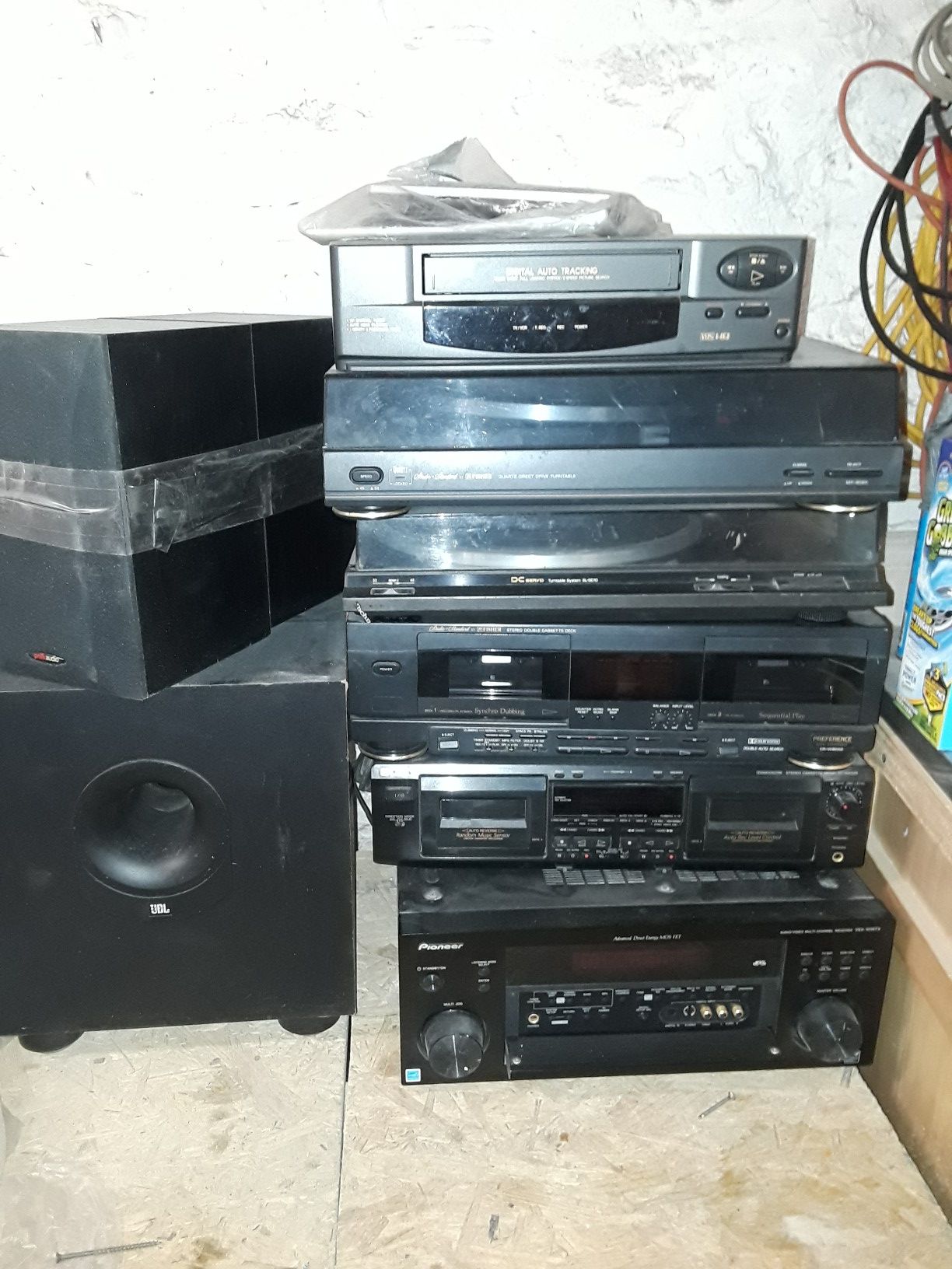 Old fashioned cassette, VHS ,Pioneer equalizer, and small speakers