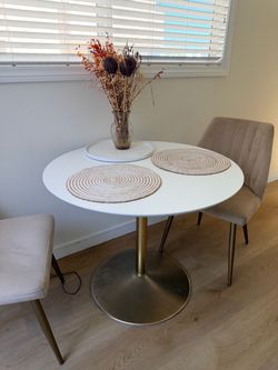 Round Pedestal Dining Table with Two Velvet Chairs