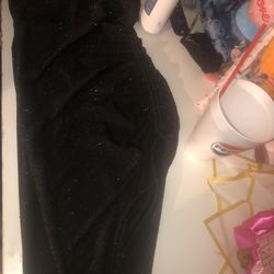 Strapless black glitter dress with a slit on one leg