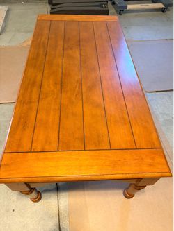 A Solid Wood Coffee Table— Klaussner