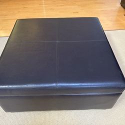 Black Faux Leather Hinged Padded Ottoman