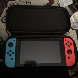 Nintendo switch with games and all power cables and docking station with case