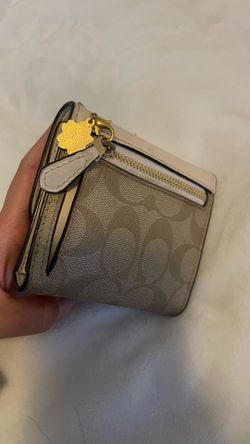 Coach beige and white wallet