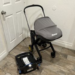 PRACTICALLY NEW DOONA+ CAR SEAT AND STROLLER!!