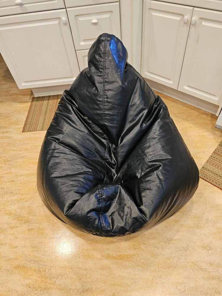 Black Bean Bag Chair and bag of extra beans