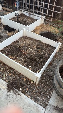 White plastic garden boxes