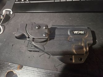 black Kydex holster made by We The People