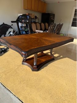 Wood table with 8 chairs and 2 table extendors