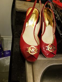 Red Michael kors size 6 serious buyers