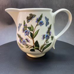 Beautiful Portmeirion BOTANIC GARDEN Speedwell Creamer 4" Romantic.  Creamer 12 oz. Small chip on bottom of handle. See pics. 