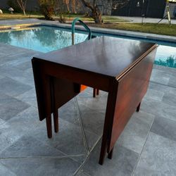 Suter's Antique Reproduced Cherry Drop Leaf Table 