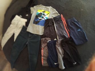 Two bags boy clothes and shoes