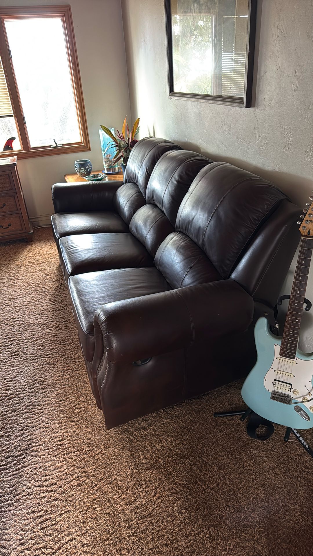 Leather Reclining Couch $250.00