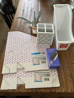 Office supplies- document holder, small plant,  pencil holder ,