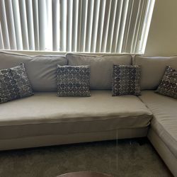 Beautiful 2 Piece Sofa With Left Chaise Pillows Included
